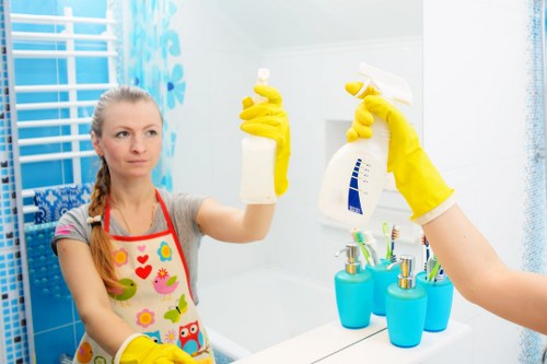 Technician preparing carpet cleaning equipment in a safe indoor setting