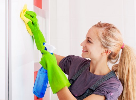 Workers and cleaning equipment symbolizing ethical labour practices