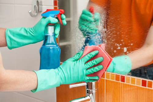 Office cleaners working in a SE17 workplace reception area