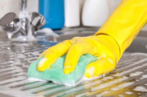Professional cleaner working in a South London SE17 property